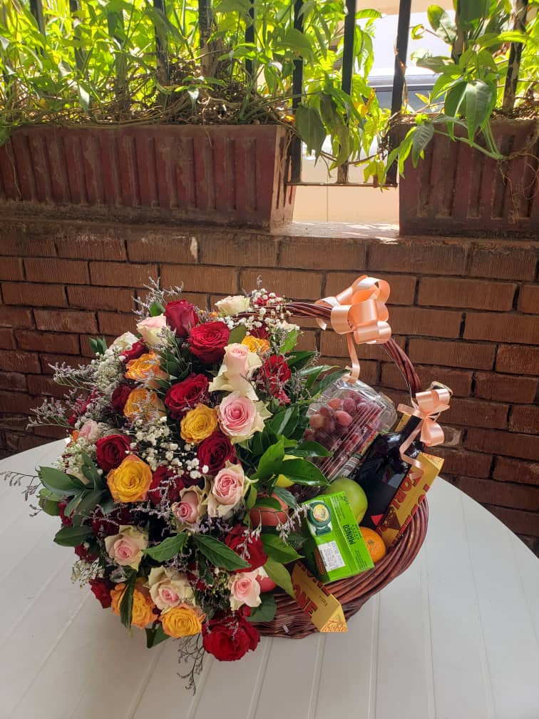 Elegant basket arrangement of fresh flowers by Eden Flower Junction